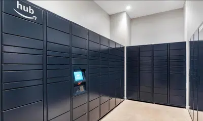 an atm machine in a locker room with blue walls at King Bed, Downtown Steps from Bengals & Reds, Minutes to OTR, TQL, HardRock in Cincinnati