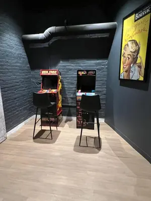 two ping pong tables and two chairs in a room at King Bed, Downtown Steps from Bengals & Reds, Minutes to OTR, TQL, HardRock in Cincinnati
