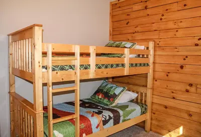 a bunk bed room with two bunk beds at Dewdrop Inn in Logan