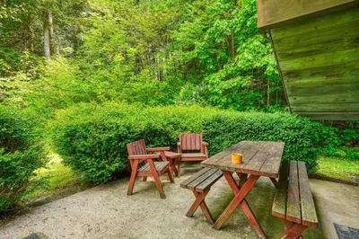 two chairs and a table and two tables and chairs at Mercer House in Sugar Grove