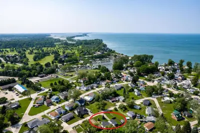 an aerial view of a village with a red circle in the middle at Family Fun: Comfy Home, 10 Min to Cedar Point Fun! in Huron