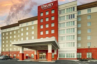 a hotel with a sign on the side of it at Drury Plaza Hotel Cincinnati Florence in Florence
