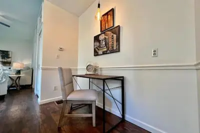 a dining room with a table and a chair at 1 Bd Hide away Historic Dayton, Oh Oregon District in Dayton