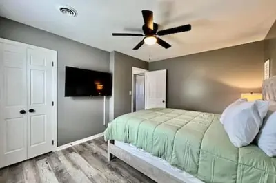 a bedroom with a bed and a ceiling fan at Sleek remodeled Design 2 Bed Trenton, OH Apartment in Trenton