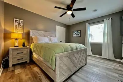 a bedroom with a bed and a ceiling fan at Sleek remodeled Design 2 Bed Trenton, OH Apartment in Trenton