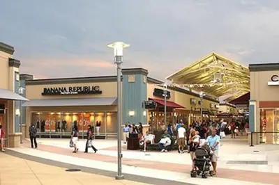 a group of people walking through a shopping mall at BRAND NEW Home away from Home among the Nook in Hamilton