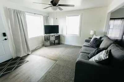 a living room with a couch and a ceiling fan at Great Location in Dayton! Updated 1 bedroom/bath. in Dayton