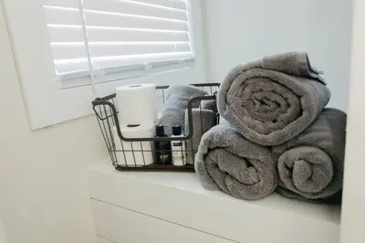 a towel rack with towels on a bathroom counter at Great Location in Dayton! Updated 1 bedroom/bath. in Dayton