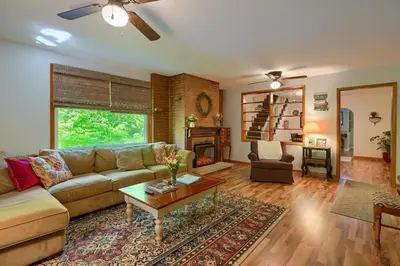 a living room with a couch and a table at Hillside Hideaway in Logan