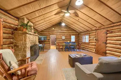 a living room in a log cabin at Russell Cabin in Logan