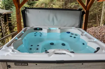 a bath tub in a gazebo at Russell Cabin in Logan