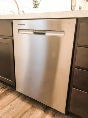 a stainless steel dishwasher in a kitchen at The Barn at Sharp Run-Modern Barn in the heart of Amish Country in Millersburg