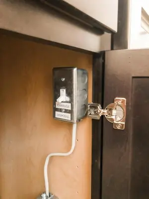 a electrical box attached to a door with a cord at The Barn at Sharp Run-Modern Barn in the heart of Amish Country in Millersburg