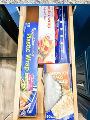 three boxes of food are on a shelf at Anchors Away - Relaxing Cottage Minutes from Lake in Buckeye Lake