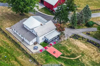 an aerial view of a house with a red barn at Meet Country Animals! Farmyard Stays Dundee Home in Dundee