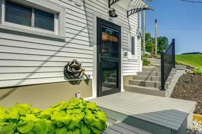 a house with a door with a mask on it at Montpelier Lake House with Deck, Dock and Fireplace! in Montpelier