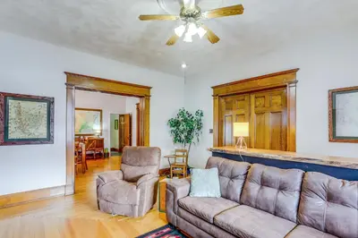 a living room with a couch and two chairs at Historic Tiffin Home about Half Mi to University! in Tiffin
