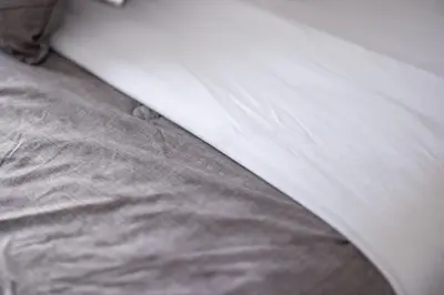 a close up of a white bedsheet at Luxury Downtown Townhome Unit 13 in Cleveland