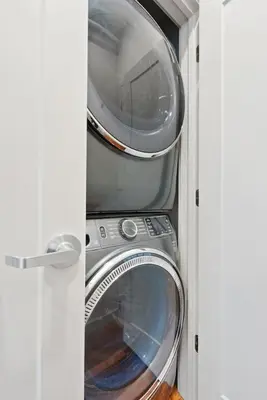 two washers and a washing machine in a cabinet at Flatiron Bldg - Views - Amazing Cafe - Near to ALL in Cincinnati