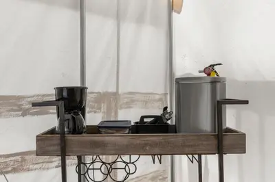 a wooden shelf with a coffee maker on it at River Front Hallowed Horse Glamp Tent 2 in Stanton