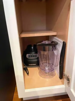 a cupboard with a blender and a microwave at OTR, QUEEN Bed, 50in TV, Workspace, Near Lightrail in Cincinnati