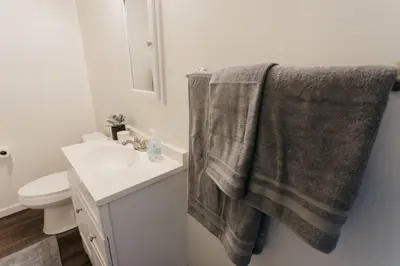a bathroom with a sink and a towel at Stylish & Cozy Home in Dayton-Close to Everything! in Dayton