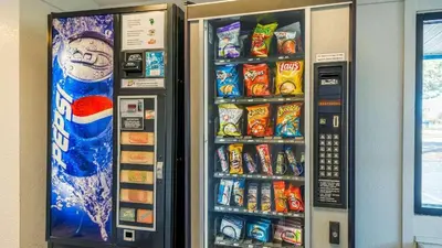 a vending machine filled with lots of food and drinks at Hilliard Motor Lodge in Hilliard