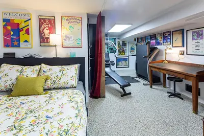 a bedroom with a desk and a bed and a table at Mike & Allen's Place on the Park_3 in Columbus