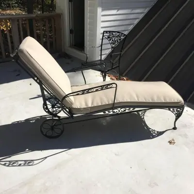 a bench sitting on a porch on a patio at Historic Farmhouse by Nature Preserve in Charleston