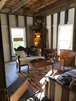 a living room with couches and chairs in a room at Historic Farmhouse by Nature Preserve in Charleston