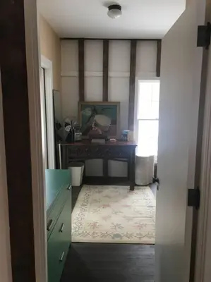 a room with a desk and a table with a window at Historic Farmhouse by Nature Preserve in Charleston