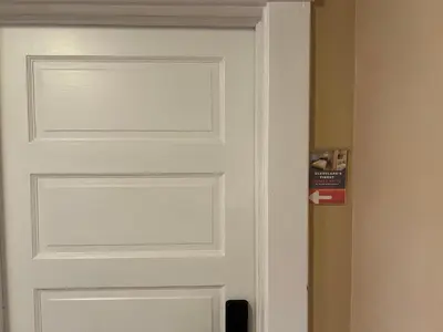 a white door in a room next to a wall at Stay with Jay - Quinta Suite in Cleveland