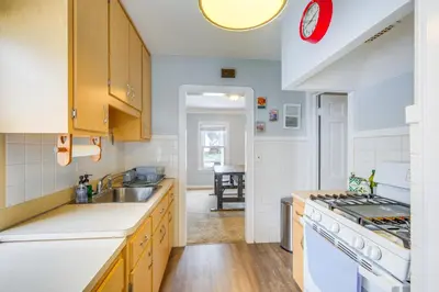 a kitchen with a sink and a stove at WFH-Friendly Abode with Home Gym in Cleveland in Cleveland