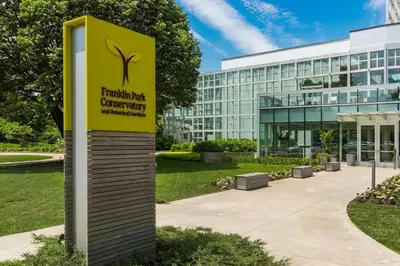 a yellow sign in front of a building at Designer 1-Bed Haven near Downtown! Pets Welcome! in Columbus