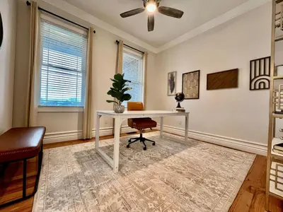a home office with a white desk and a chair at NEW, big, beautiful, Executive Home Liberty Twp in Middletown