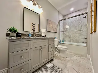 a bathroom with a sink and a toilet and a shower at Luxury Home Incredible master suite Liberty Twp OH in Middletown