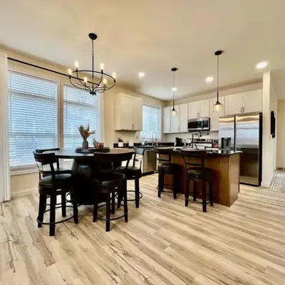 Beautiful NEW Ranch Home with a large deck and games