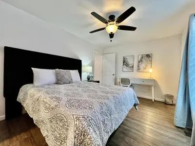 a bedroom with a bed with a ceiling fan at Brand new, hidden Pearl of a home Batesville, IN in Batesville