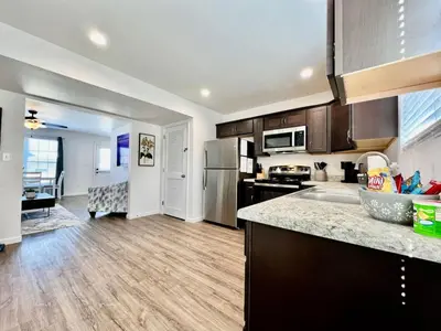 an open kitchen with a counter top and a kitchen sidx sidx sidx sidx at Brand new, hidden Pearl of a home Batesville, IN in Batesville