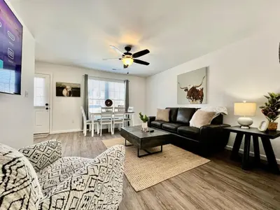 a living room with a couch and a table at Pearl of a new construction home Batesville, IN in Batesville