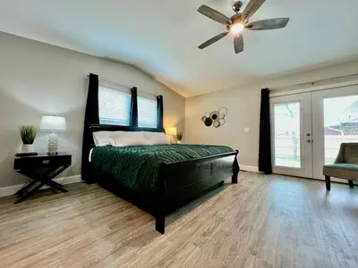 a bedroom with a bed and a ceiling fan at New remodel exquisite master suite Trenton, Ohio in Trenton