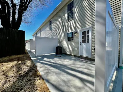 a house with a white door and a fence at Pearl of a home, central Batesville, IN -New build in Batesville