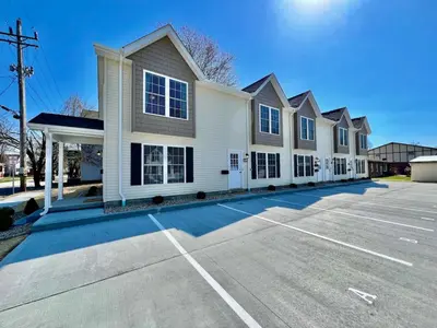 a parking lot in front of a building at Pearl of a home, central Batesville, IN -New build in Batesville