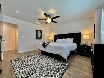 a bedroom with a bed and a ceiling fan at Pearl of a home, central Batesville, IN -New build in Batesville