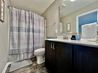 a bathroom with a sink and a toilet and a shower at Brand new Executive home in Liberty Twp, Ohio in Maustown