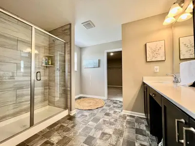 a bathroom with a shower and a sink at Brand new Executive home in Liberty Twp, Ohio in Maustown