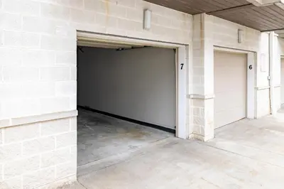 a garage with two garage doors on a building at Luxury Downtown Townhome Unit 7 in Cleveland