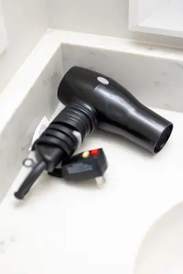 a black flashlight sitting on top of a counter at Luxury Downtown Townhome Unit 15 in Cleveland