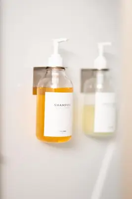 two bottles of honey on a white background at Luxury Downtown Townhome Unit 5 in Cleveland