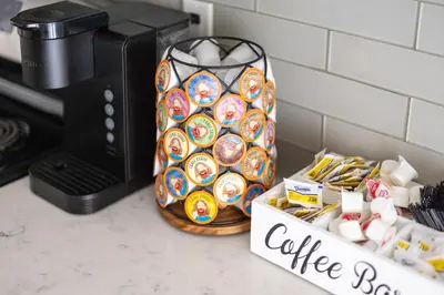 a coffee box of donuts next to a coffee maker at Luxury Downtown Townhome Unit 5 in Cleveland